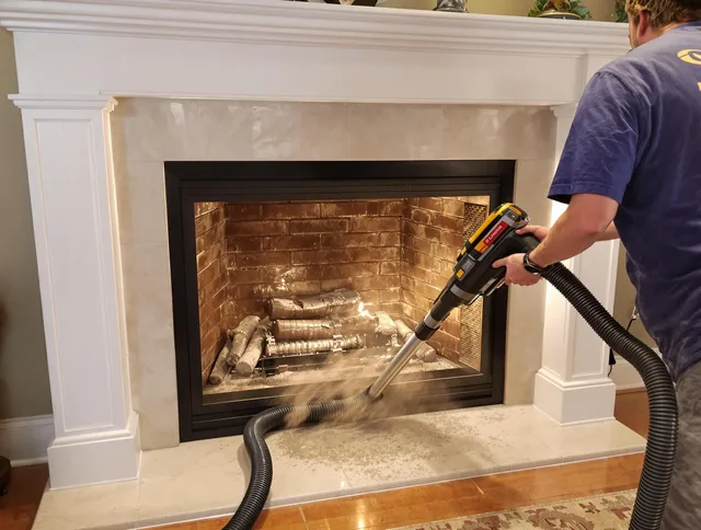 Fireplace cleaning performed by New Milford Chimney Sweep in New Milford, CT